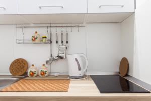 a kitchen with a sink and a counter top at Apartment Marija in Zagreb