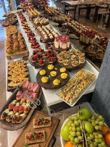 a buffet line with many different types of food at Alberello Otel in Kütahya +1 photo