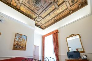 Hotel St. Moritz tesisinde bir televizyon ve/veya eğlence merkezi