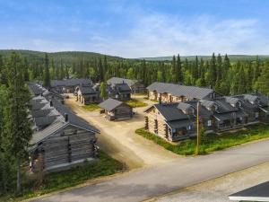 an aerial view of a village with log homes at Holiday Home Sapara c10 by Interhome in Äkäslompolo