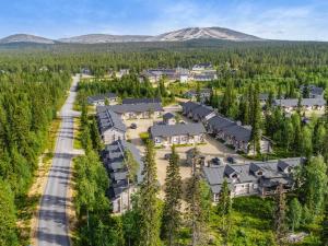 an aerial view of a home in a forest at Holiday Home Sapara c10 by Interhome in Äkäslompolo