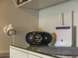 a kitchen counter with a radio and a blender at Holiday Home Levi star 1009 by Interhome in Levi