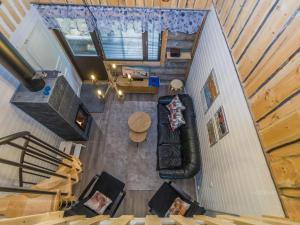 an overhead view of a living room with a table at Holiday Home Kantapää d2 by Interhome in Luosto