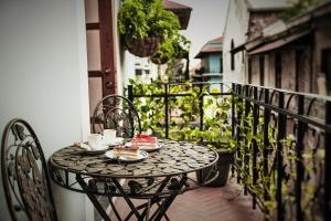 Uma varanda ou terraço em La Isabela Suites