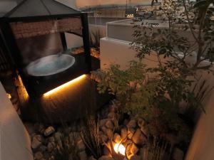 a bathroom with a toilet and a sink at HOTEL SWEET SEASON-L in Ginan