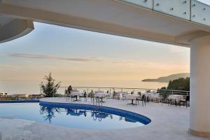 a view of a swimming pool from a house at Skyline Sunset in Bečići