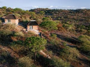 an aerial view of two houses on a hill at Cascata Lodge in Outjo
