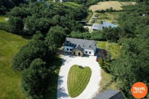 an aerial view of a house with a large green field at Heartbeat Cottage By Travel Lets Holiday Homes Letterkenny With Private Ensuite Rooms & Garden in Letterkenny