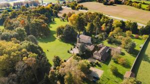 an aerial view of a large house in a field at Château de Bissieux in Châtillon-sur-Chalaronne