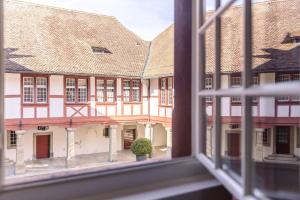 a view of a building from a window at Bed and Breakfast Kloster Frienisberg in Seedorf