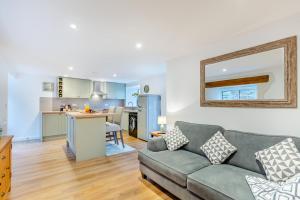 a living room with a couch and a kitchen at 3 Bed in Yeolmbridge oc-t30293 in Werrington