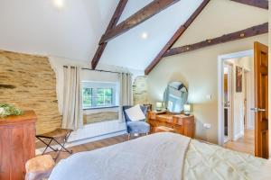 a bedroom with a bed and a desk and a mirror at 3 Bed in Yeolmbridge oc-t30293 in Werrington