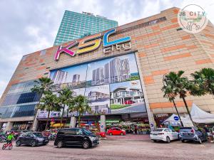 a large building with a large sign on it at Austin Manhattan by RR JBcity in Gua Sai +23 photos