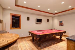 a room with a pool table in a room at Abode at Teton Manor in Jackson
