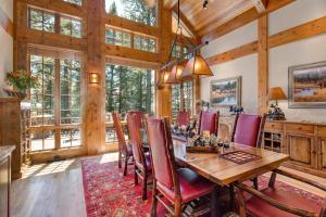 a dining room with a table and chairs at Abode at Two Wolves in Teton Village