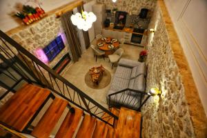 an overhead view of a living room with a table at Cliffside Villa Vilić in Vrgorac