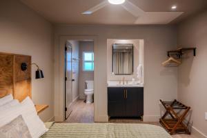 a bathroom with a sink and a toilet at Gloria Inn - Unit 8 in Waco