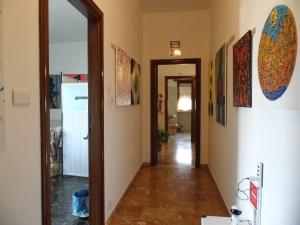 a hallway in a house with a mirror and a door at Suite seven &Home Restaurant in Paglieta +14 photos