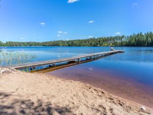 a dock on a large body of water at Holiday Home Valonsäde by Interhome in Valkeala