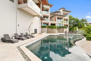 an image of a swimming pool in a house at Panaromic Oceanview Luxury 3BR Private Rooftop in Tamarindo
