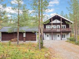 a large house with a porch and a balcony at Holiday Home Lux iii by Interhome in Salla