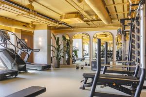 a gym with treadmills and elliptical machines at Charles Hope Cambridge in Cambridge