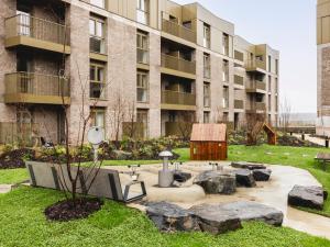 a garden in front of an apartment building at Charles Hope Cambridge in Cambridge