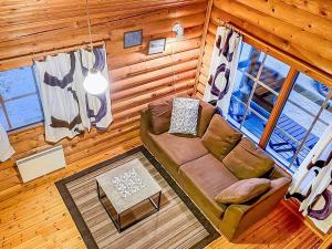 an overhead view of a living room with a couch at Holiday Home Lumomarja by Interhome in Pyhätunturi