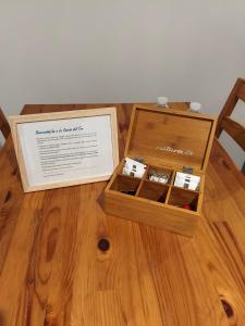 a wooden box sitting on top of a wooden table at La Caseta del Ter in San Juan de Mollet