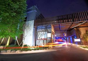 a police car in front of a building at night at Region Motel in Lugang +44 photos