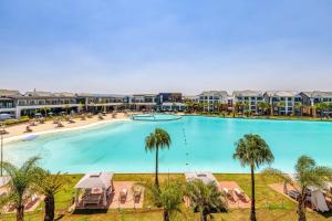 an image of a large swimming pool at a resort at The Blyde Luxury Apartments in Pretoria
