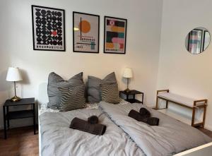 a bedroom with a bed with two towels on it at Appartement "Peter" in Köthen mit 3 Schlafzimmern in Köthen