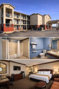 a hotel room with a bed and a building at Spring Place Inn & Suites in Millington