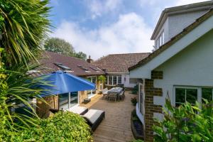 an external view of a house with a patio at 4 Bed in Ovingdean oc-bbvale in Rottingdean