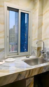 Un baño de Hôtel Foham Oasis