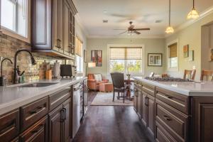 a kitchen with a sink and a counter top at Capmar House -Huge Home & Pool in Stock Island