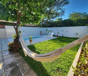 a hammock in the yard of a house at La Calma San Bernardino in San Bernardino