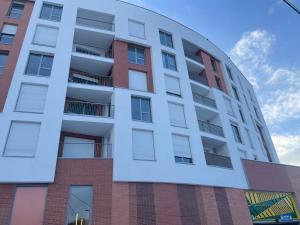 an external view of an apartment building at Studio haut standing confort et modernité in Clichy-sous-Bois