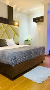 Una cama o camas en una habitación de Hôtel Foham Oasis 12 fotos más