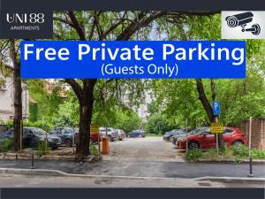 a street with cars parked in a parking lot at 2 Hidden Gems - all U need - by Uni88 in Bucharest