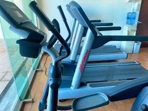 a gym with several exercise bikes on a treadmill at Hotel Villa Florida Veracruz in Veracruz