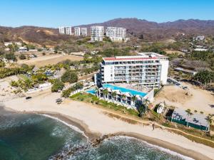 an aerial view of the hotel and the beach at Zantamar 105B, a pie de playa in Cruz de Huanacaxtle
