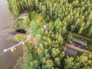 an aerial view of a campgrounds next to a river at Holiday Home Pöllö by Interhome in Verla +20 photos
