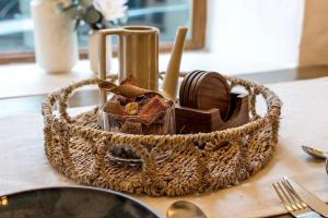a basket filled with items on a table at Hoot Cottage in Oakworth