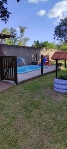 a playground with a pool in a park at Pousada Mosselini in São Gabriel +17 photos