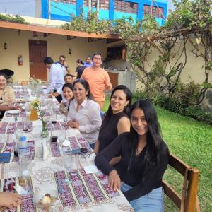 a group of women sitting at a table at La Casa de Isidora in Pan de Azúcar