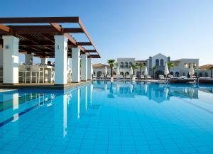 a view of the pool at the resort at Anemos Luxury Grand Resort in Georgioupolis +149 photos