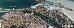a map of a city and the ocean at Casa da Praia Bem Viver in Santa Cruz Cabrália +4 photos