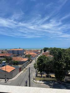 a view of a street in a city with buildings at Flat com vista mar in Mucuri
