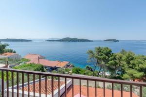 a view of the water from a balcony at Studio Prizba 12648d in Prizba +10 photos